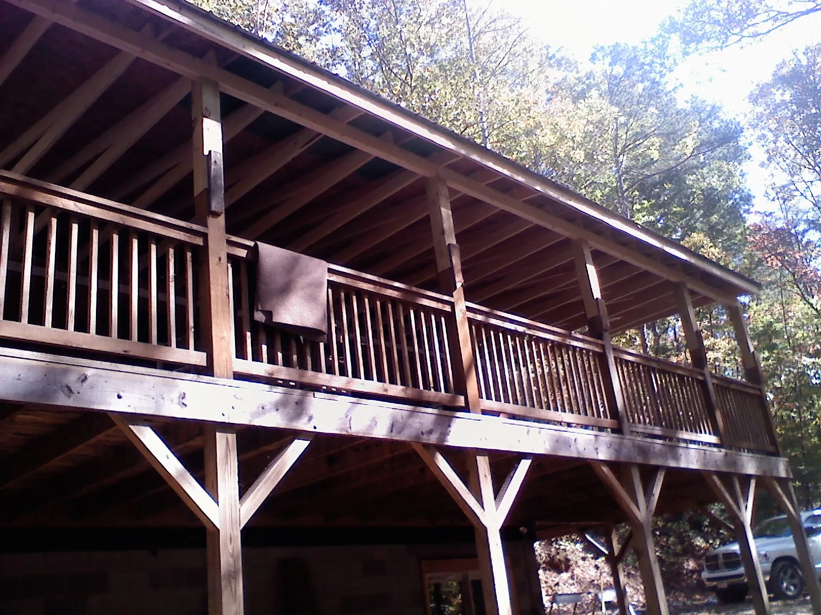 Timber framing under a new elevated porch and deck — Roof Leak Repair in Olney Springs by Roofing Brothers